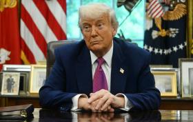 US President Donald Trump listens during an announcement about the Golden Dome missile defense shield, in the Oval Office of the White House on May 20, 2025, in Washington, DC